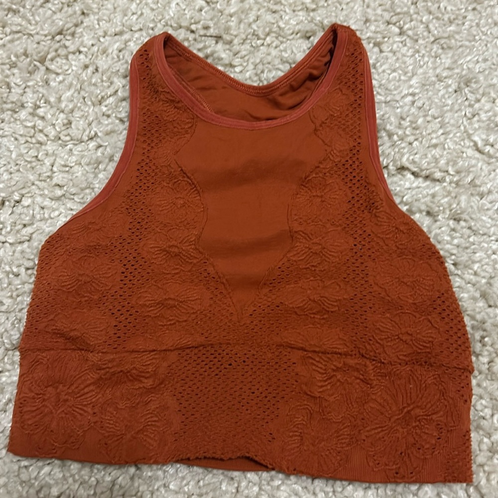 Free people tank top in a burnt orange color